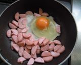 A picture of step 2 of Rice Bowl with Fish Sausage in Scrambled Eggs.