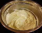 A picture of step 7 of Peppermint / Vanilla Layered Creamy Cheesecake.