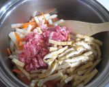 A picture of step 6 of Comforting Simmered Daikon Radish, Carrot and Aburaage.