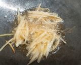A picture of step 4 of Fried Green Papaya.