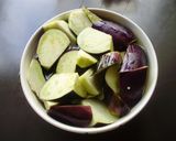A picture of step 1 of Stir-Fried and Simmered Eggplants, Green Beans and Deep-fried Tofu.