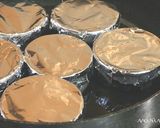 A picture of step 6 of Steam in the Frying Pan Smooth Pudding.