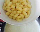 A picture of step 7 of Seafood Gnocchi With White Wine Parmesan Sauce.