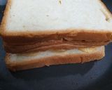 A picture of step 3 of Cheesy Banana Peanut Butter Toast.