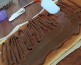 Foto del paso 5 de la receta: Pionono relleno de dulce de leche, decorado con crema chantilly