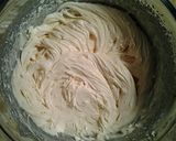 A picture of step 14 of Fresh Strawberry Chiffon Layer Cake with Chocolate and Strawberry Whipped cream.