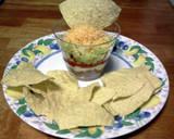 A picture of step 7 of Individual Seven Layer Dips.