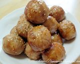 A picture of step 9 of Meat Wrapped Onigiri Rice Balls using Shabu-Shabu Pork Slices.