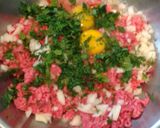 A picture of step 2 of Greek Meat-Stuffed Grape Leaves / Dolmadakia me Kima.
