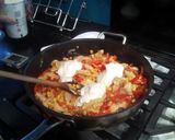 A picture of step 6 of Turkey with pointed peppers, creme fraiche and pasta..