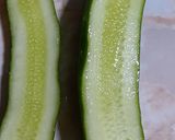 A picture of step 2 of Sweet corn chat in cucumber boat.