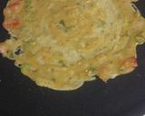 A picture of step 3 of Besan ka chilla.