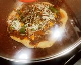 A picture of step 15 of Cheesy crust veg Pizza in tawa.