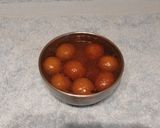 A picture of step 10 of Bread Gulab Jamun.