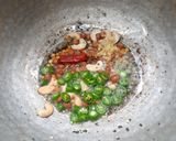 A picture of step 2 of Mamidikaya pulihora or mavinakayi chitrana / Mango rice.
