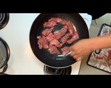 A picture of step 1 of Whitney & Bobby”s Beef Hoisin Noodles with Cabbage.