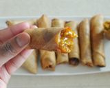 A picture of step 8 of Chicken springrolls.