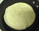 A picture of step 7 of Ham Egg And Cheese Burritos.
