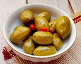 Hình bước làm 1 của món Quả trám/cà na ngâm đường phèn