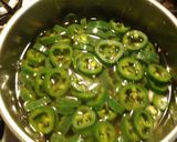 A picture of step 3 of Pickled Japalenos.