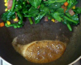 A picture of step 6 of Butter-Sautéed Spinach with Caramelized Soy Sauce.