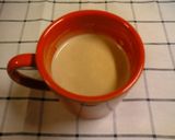 A picture of step 6 of Easy Rich Milk Tea in a Microwave.