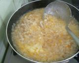 A picture of step 6 of Egg and Rice Porridge.