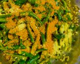 A picture of step 3 of Raita marcha / pickled green chillies.