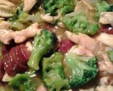 A picture of step 6 of chicken and sausage in duck sauce.