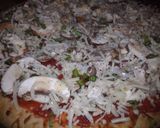 A picture of step 7 of Quick Jazzy Crab & Mushroom Pizza.
