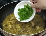 A picture of step 7 of Green Masala Chicken Curry.