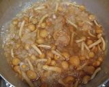A picture of step 4 of Comfort Food For Fall and Winter: Chicken Simmered in Nameko Mushrooms and Daikon Radish.