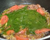 A picture of step 6 of SPINACH RICE with PEAS..