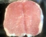 A picture of step 2 of Tinklee's BBQ Bacon Wrapped Stuffed Pork Chops.