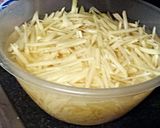 A picture of step 8 of Portuguese Bacalhau A Bras (salted cod).