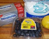 A picture of step 1 of Mike's Blueberry Lemon Bagel Spread.