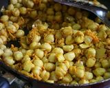 A picture of step 12 of Macrobiotic Style Chana Masala.