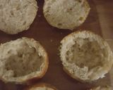 A picture of step 1 of Egg in a dinner roll.