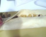 A picture of step 6 of Sautéed Apple and Raisin Pull Apart Bread.