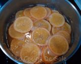 Foto del paso 6 de la receta Naranjas confitadas con chocolate