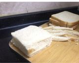 A picture of step 2 of Egg-cheese salad in bread cups.