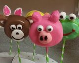 A picture of step 2 of Chocolate dipped marshmallow animals pops.