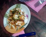 A picture of step 31 of Khatti meethi smoking dahi bhalla.