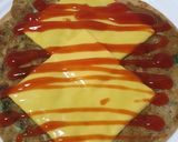 A picture of step 11 of Egg Paratha Salad Roll.