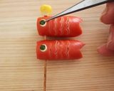 A picture of step 11 of Wiener Sausage Koinobori (Flying Carp).