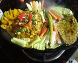 A picture of step 6 of Kathiyawadi Sizzler.