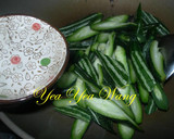 A picture of step 5 of Stir-Fried Snake Gourd with Dried Fish.