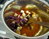A picture of step 3 of Potato-Brinjal Curry.