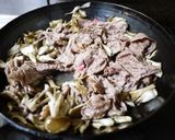 A picture of step 4 of Beef and Maitake Mushroom Stir Fry with Butter Soy Sauce.