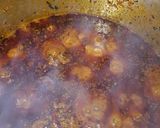 A picture of step 13 of Egusi soup with ugu and bitter leaf.